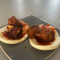 A picture of Spicy Pork Belly Buns.