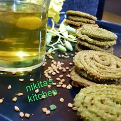 Spinach Chakli with Fenugreek tea A picture of Spinach Chakli with Fenugreek tea.