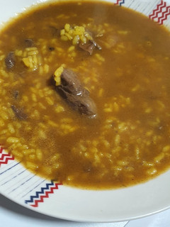 Una foto de Arroz con higaditos de pollo