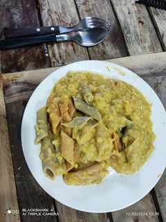 Una foto de Mostacholli con salsa de calabaza y queso
