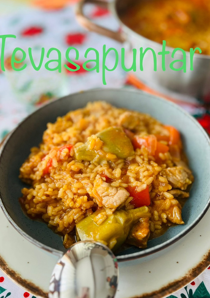 Una foto de Arroz meloso de solomillo y alcachofas