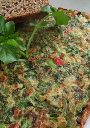 Una foto de Tortilla de berro