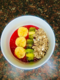 A picture of Mango, beetroot and mint smoothie bowl.