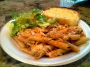 A picture of penne sauce