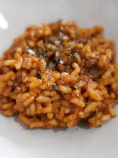 Una foto de Arroz meloso de ternera rustida con ceps y foie