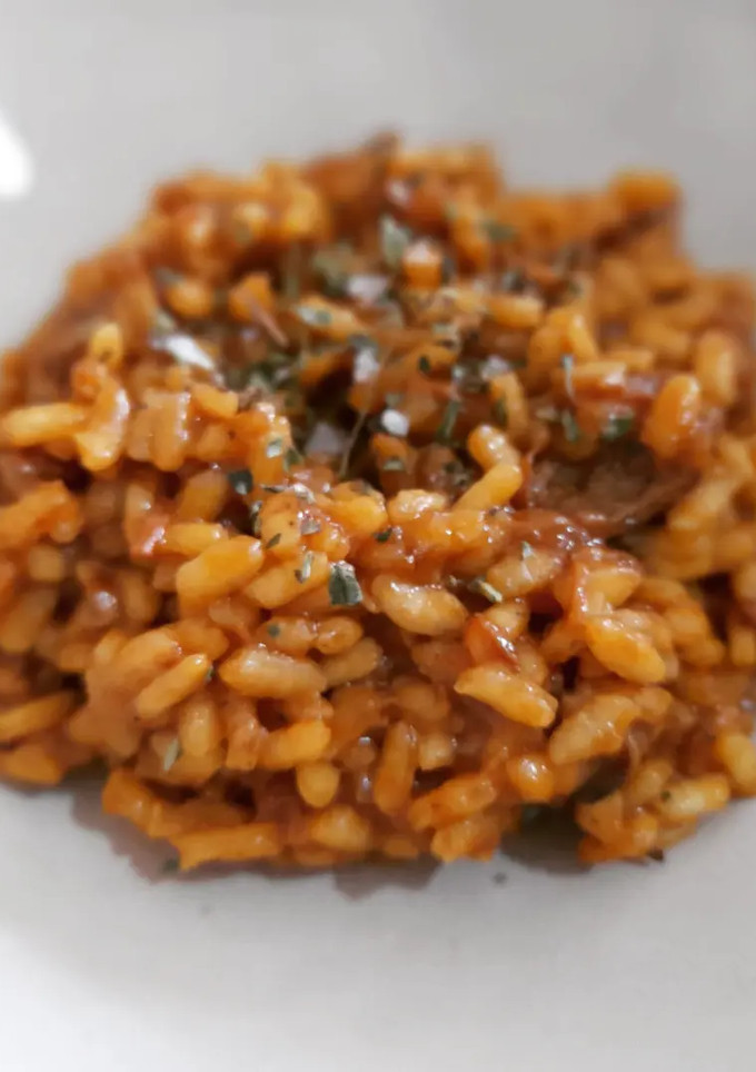Una foto de Arroz meloso de ternera rustida con ceps y foie