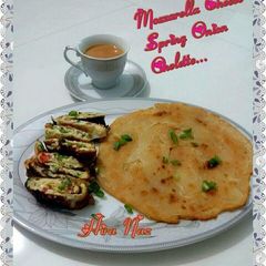 A picture of Paratha With Mozzarella Cheese Spring Onion Omelette.