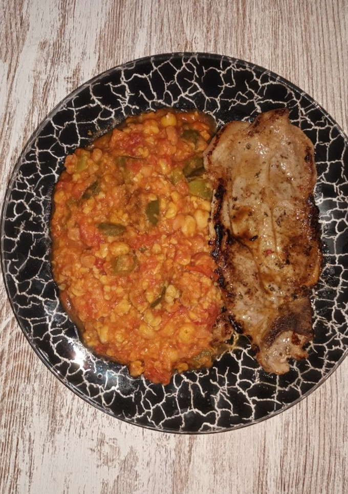 Una foto de Garbanzos con tomate