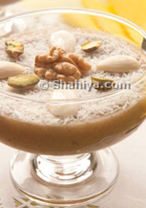 A picture of Meghli (Lebanese Spiced Rice Pudding).