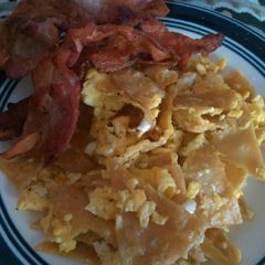 A picture of Chilaquiles with Bacon.