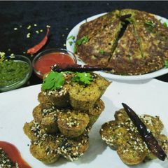 Moong dal handvo and handvo muffins A picture of Moong dal handvo and handvo muffins.
