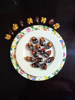 A picture of Walnuts in Dates Dipped In Chocolate.