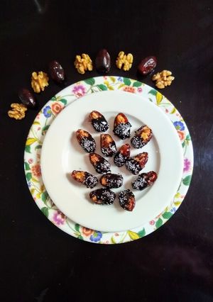 A picture of Walnuts in Dates Dipped In Chocolate.