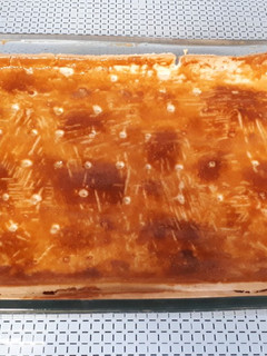 Una foto de 62. Empanada de carne picada, bacon y berenjena