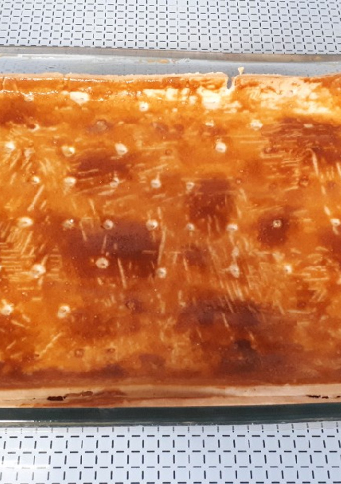 Una foto de 62. Empanada de carne picada, bacon y berenjena