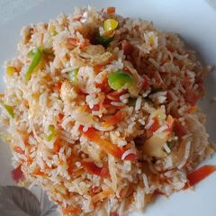 A picture of Chicken veggies fried rice.