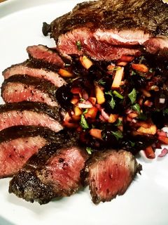 A picture of Grilled Wagyu Flat Iron Steak with Cherry & Peach Salsa.