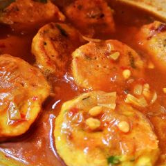 A picture of Spicy curry of egg fritters.