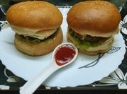 A picture of breaded chicken burgers