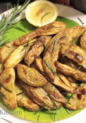 A picture of Rosemary Flavoured Baked Potato Wedges.