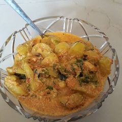 A picture of Parbal curry with coconut milk.