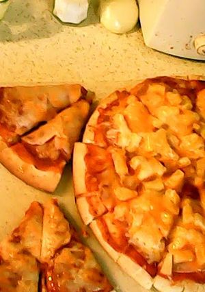 A picture of simple n fast 20 minute hawaian and pepperoni pizza.