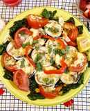 Almejas a la parmesana con espinacas