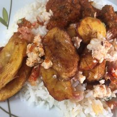 A picture of White Rice & Goat Meat Stew.