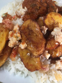 A picture of White Rice & Goat Meat Stew.