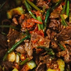 A picture of Beef Belado with Thai Asparagus & Baby Bittergourd.