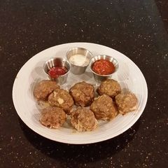A picture of Meatloaf Style Meatballs.