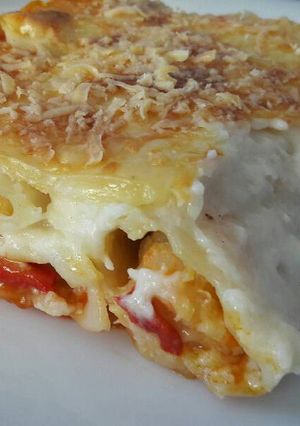 Una foto de Canelones con bacalao y gambas