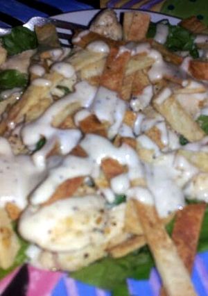 A picture of Chicken Caesar Salad.