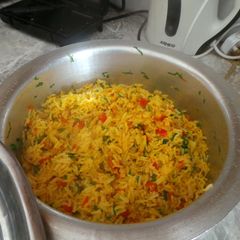 A picture of Coconut Fried Rice with butter-steamed veggies.
