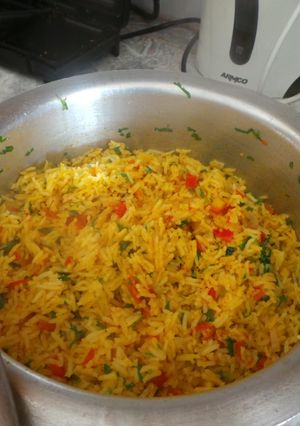 A picture of Coconut Fried Rice with butter-steamed veggies.