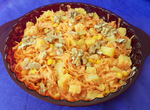 Una foto de Ensalada especial de zanahoria, palmitos, choclo y queso