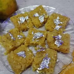 A picture of Orange coconut burfi.