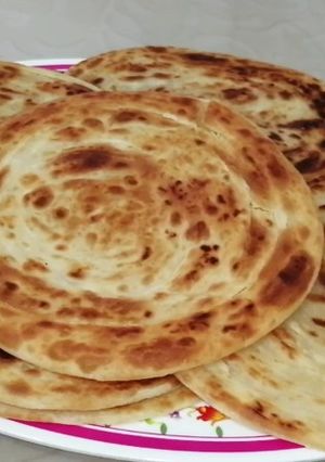 A picture of Ghee and coconut milk chapat.