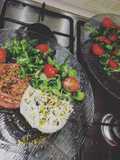 Beef Tartare with Salad, Cherry Tomatoes, Burrata, and Pistachios