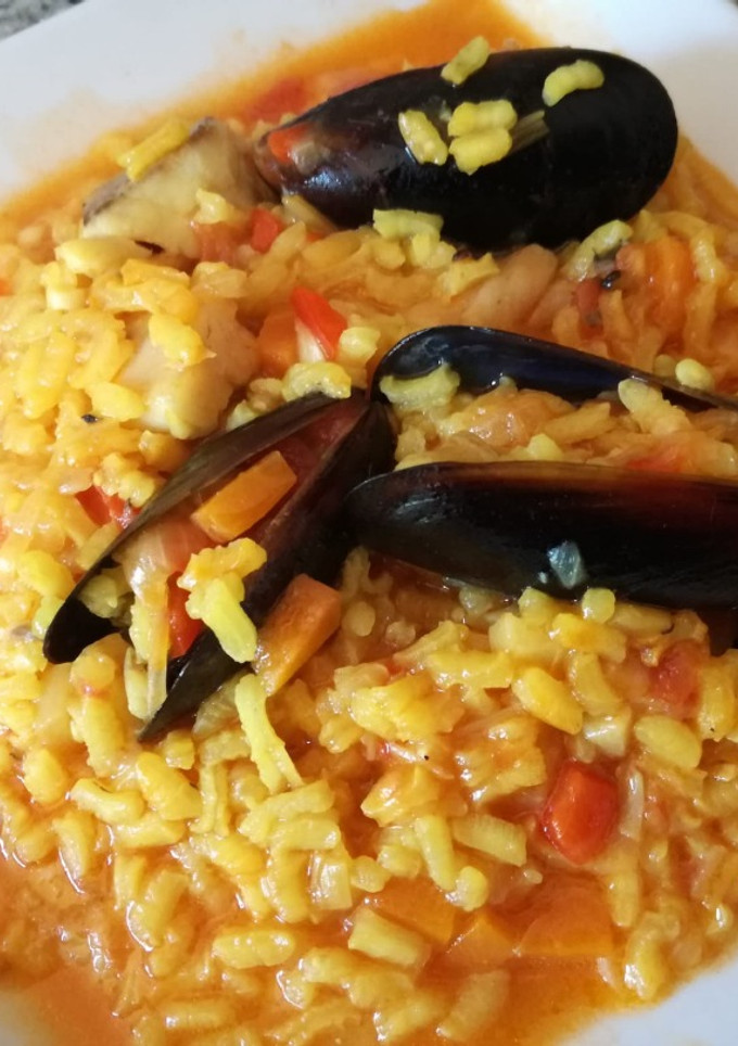 Una foto de Arroz meloso con pescado