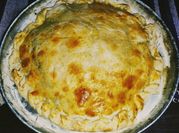Una foto de tarta ricota con tapa