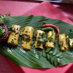A picture of Leftover kadi khandvi.