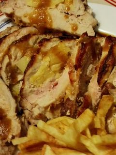 Una foto de Cinta de lomo rellena con piña