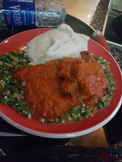 A picture of Okro soup with buka stew and semo.