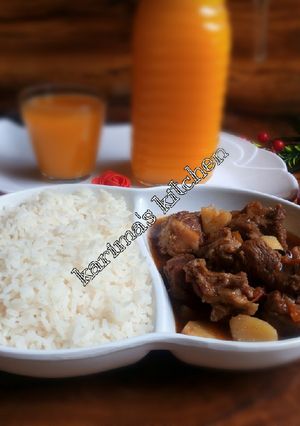 A picture of White rice and lamb peppersoup.