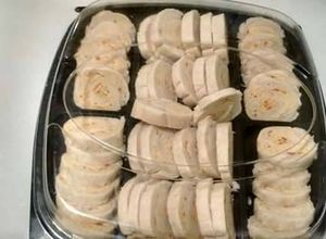 Una foto de Enrollados de dip de pollo