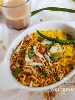 पेरी पेरी कान्दा पोहा (peri peri kanda poha recipe in Hindi) रेसिपी मुख्य फोटो