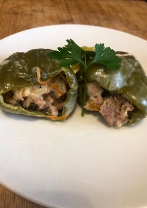 Foto di Peperoni ripieni di salsiccia e formaggio filante