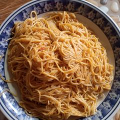 A picture of Jollof sphagetti.
