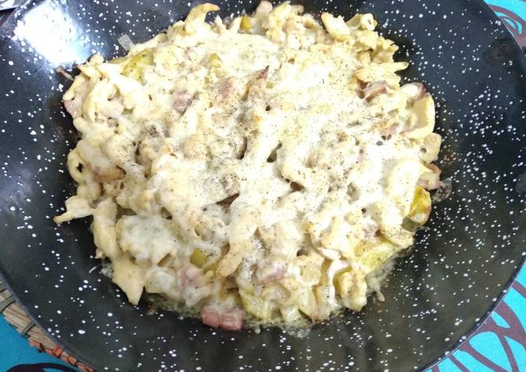 Patatas al horno con bacon y pollo